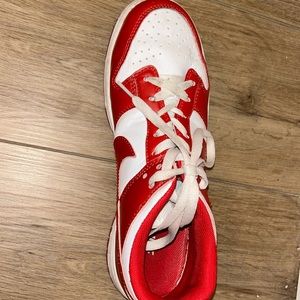Red and white Nike dunk lows